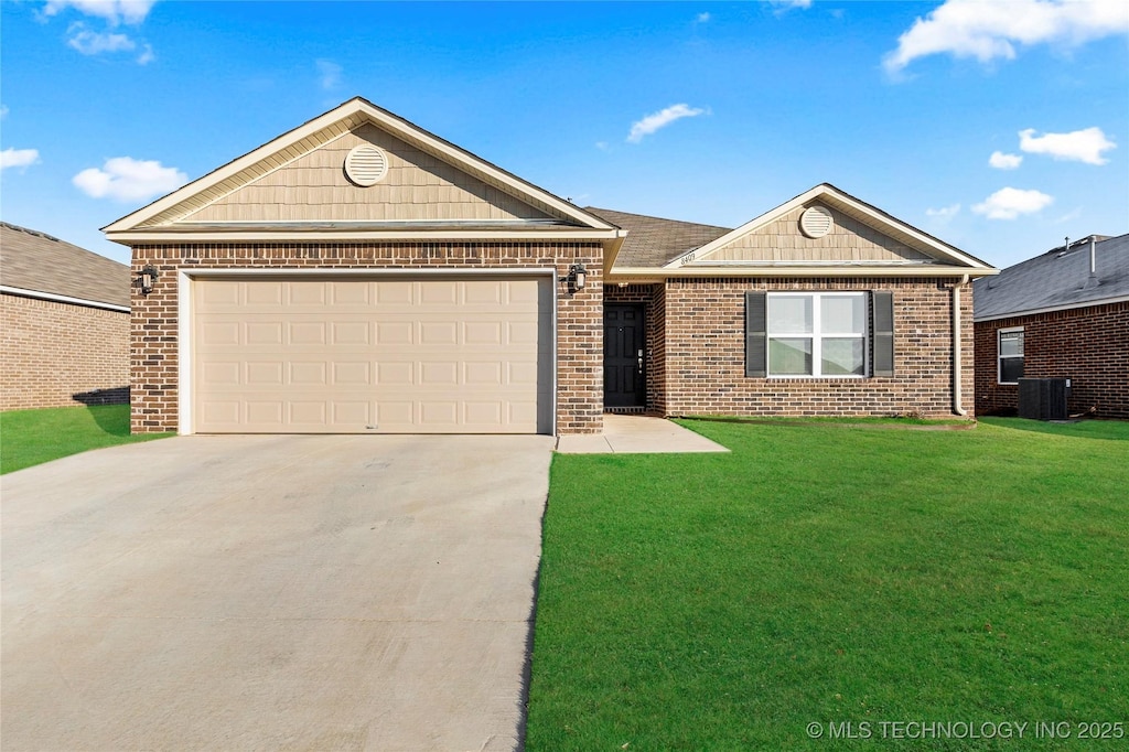 ranch-style home with a front yard and a garage