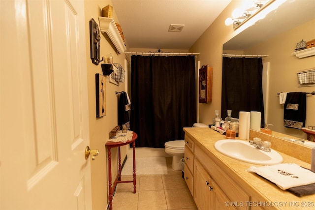 bathroom with walk in shower, tile patterned flooring, vanity, and toilet