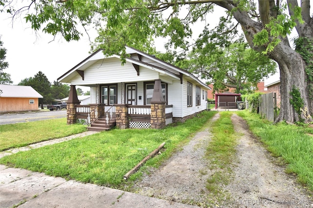 bungalow-style house featuring a porch