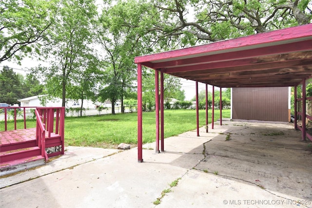 view of patio / terrace with a carport