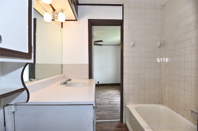 bathroom featuring hardwood / wood-style floors and vanity