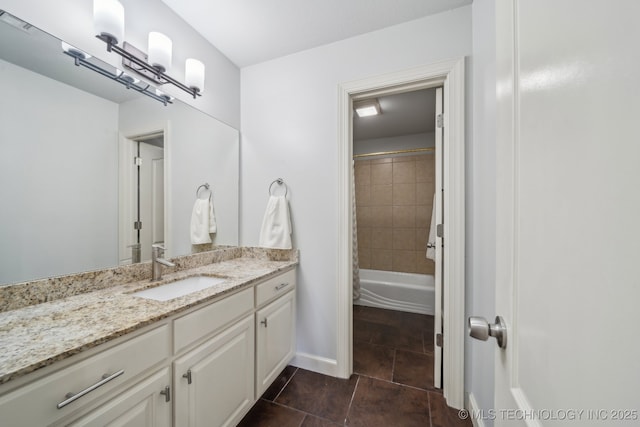 bathroom featuring vanity and shower / bath combo