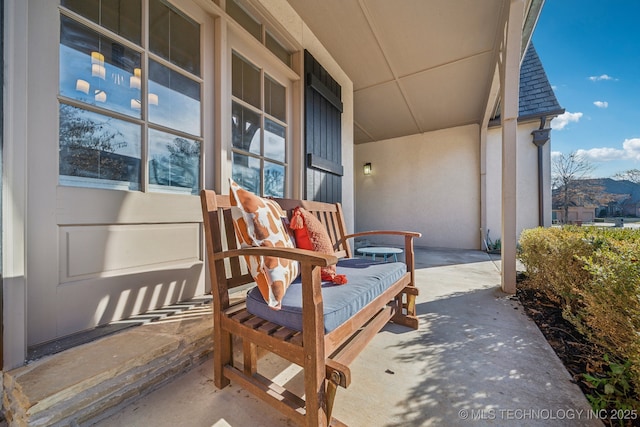 view of patio featuring covered porch