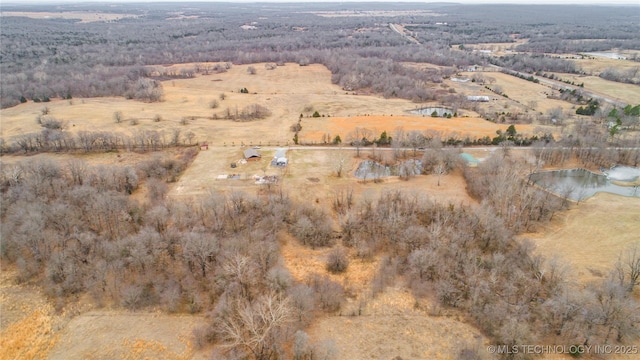 bird's eye view with a water view and a rural view