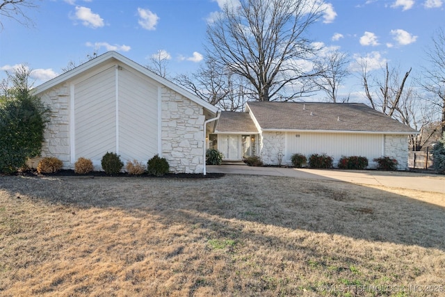 view of home's exterior featuring a lawn