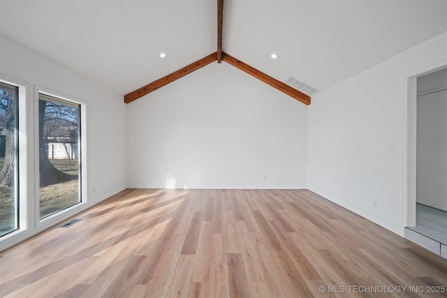 unfurnished living room featuring beamed ceiling, light wood-type flooring, and high vaulted ceiling