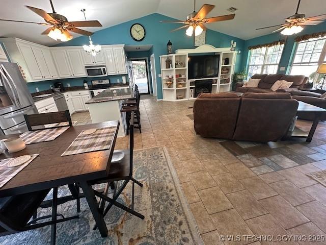 dining room with lofted ceiling