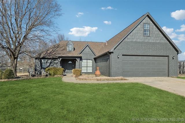 view of front of home with a front lawn and a garage