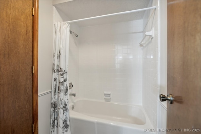 bathroom featuring shower / bath combination with curtain