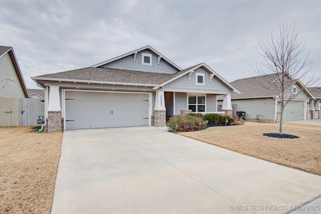 craftsman-style house with a garage and a front lawn