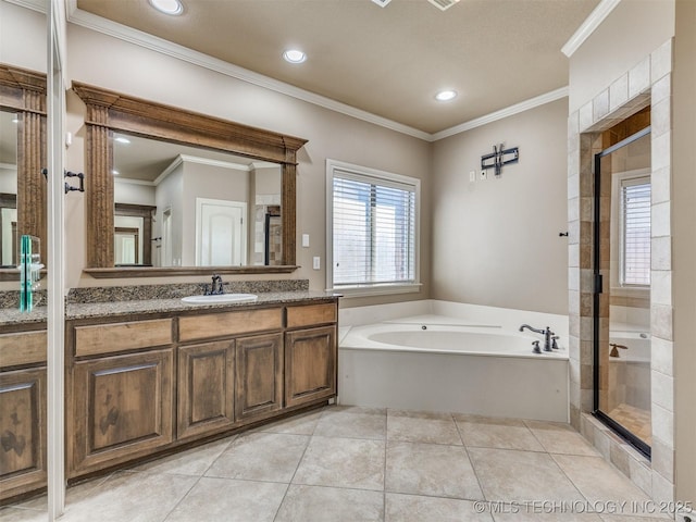 bathroom featuring plus walk in shower, tile patterned flooring, vanity, and ornamental molding