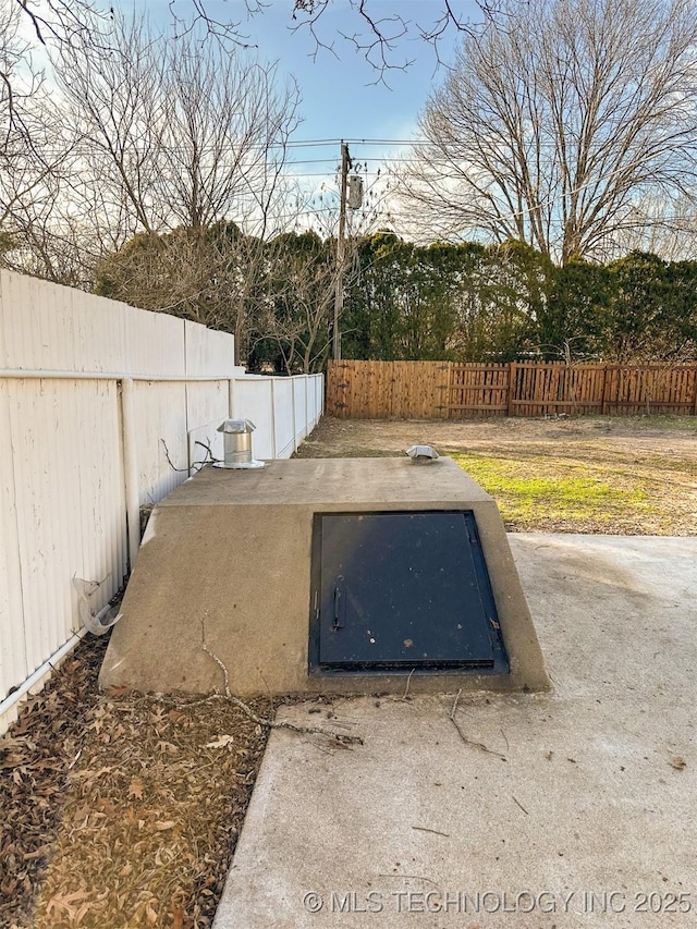 view of entry to storm shelter