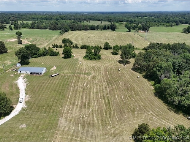 birds eye view of property featuring a rural view