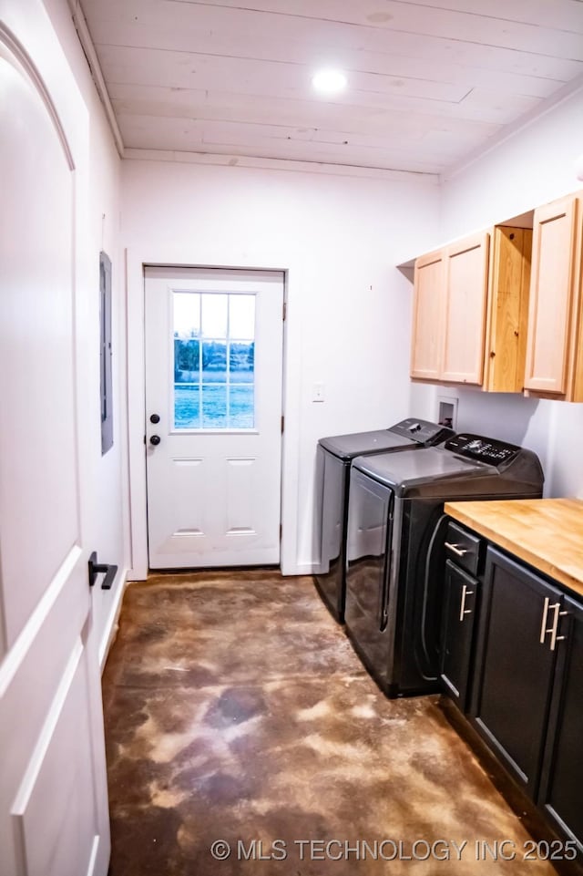 laundry room featuring cabinets, washer and dryer, and wood ceiling