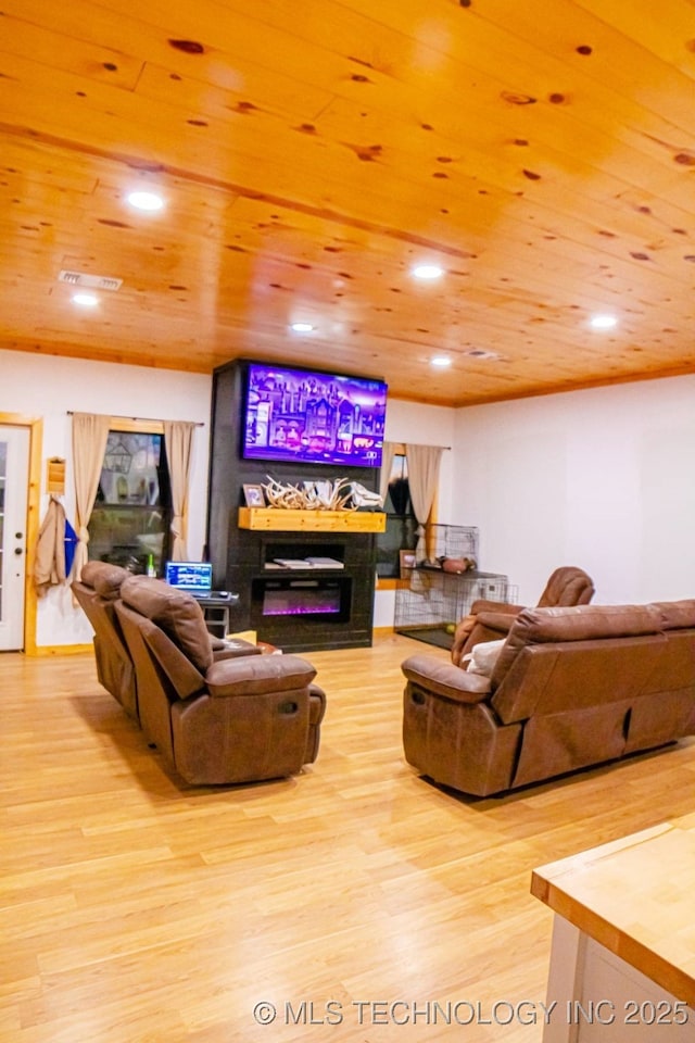 living room with wooden ceiling and light wood-type flooring