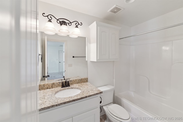 full bathroom featuring vanity, toilet, and shower / tub combination