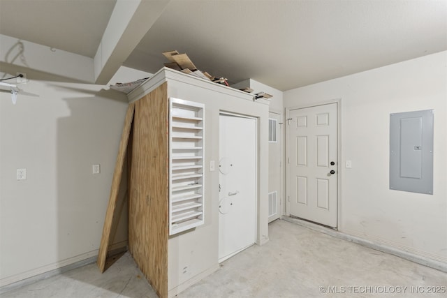 interior space with electric panel and a closet