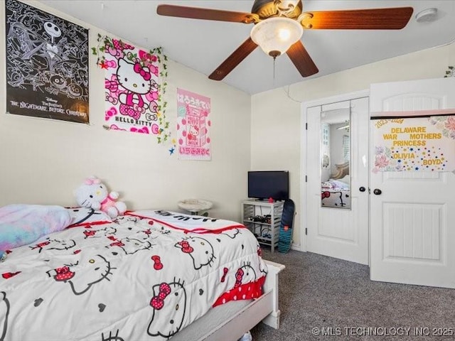 carpeted bedroom featuring ceiling fan and a closet