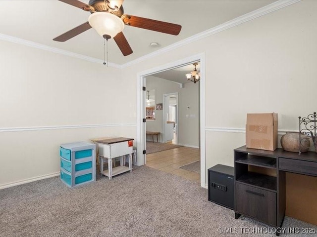 interior space with ceiling fan with notable chandelier, light colored carpet, and ornamental molding