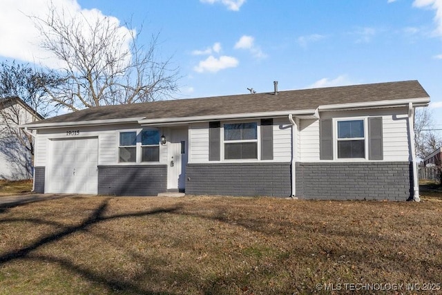 ranch-style house with a garage and a front lawn