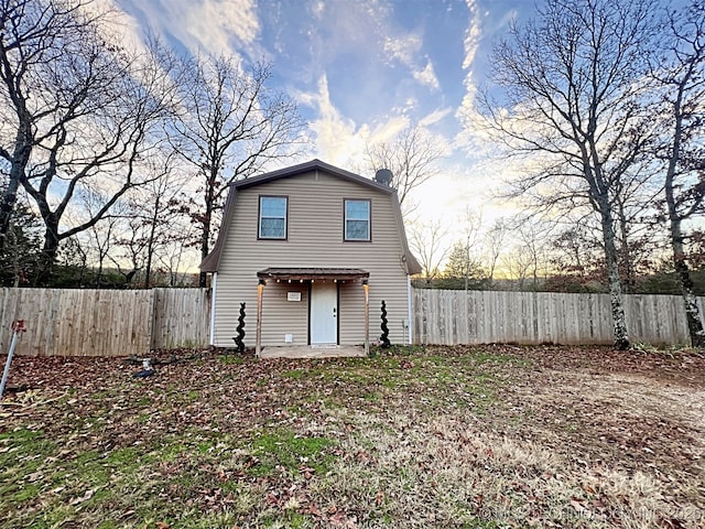 rear view of house with a patio