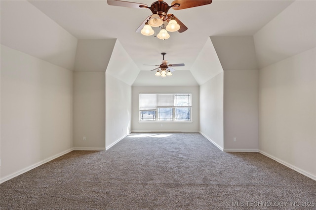 bonus room featuring lofted ceiling, carpet floors, and ceiling fan