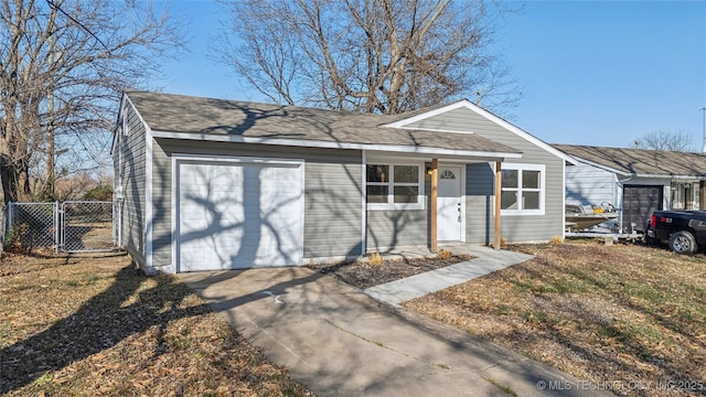 ranch-style house featuring a garage