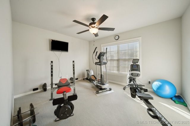 exercise room with ceiling fan