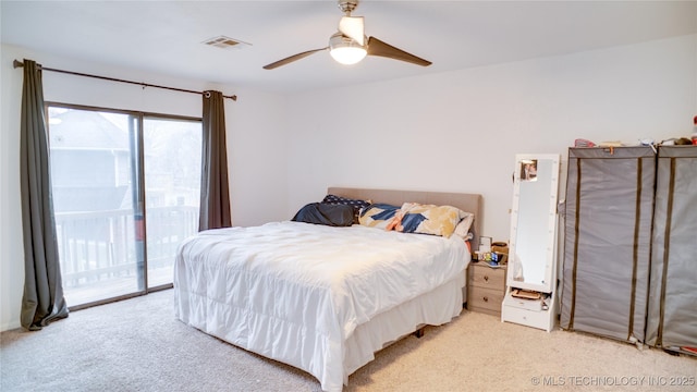 carpeted bedroom with ceiling fan and access to exterior