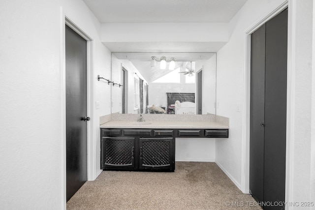 ensuite bathroom featuring ensuite bathroom and vanity