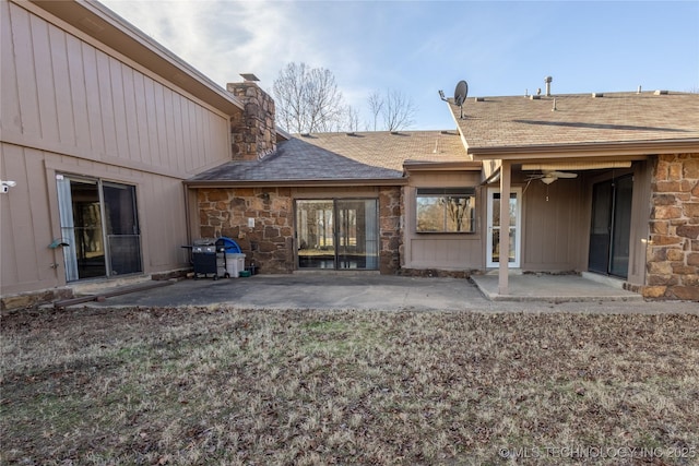 back of house with a patio area