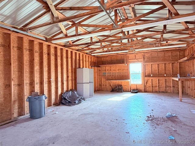 garage with white refrigerator