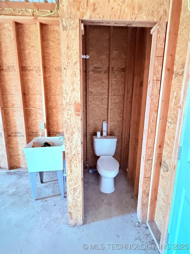 bathroom featuring toilet