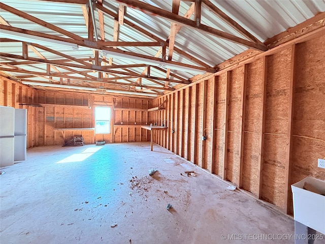 interior space featuring vaulted ceiling