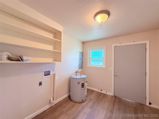 laundry area with hookup for an electric dryer, electric water heater, hookup for a washing machine, a textured ceiling, and light wood-type flooring