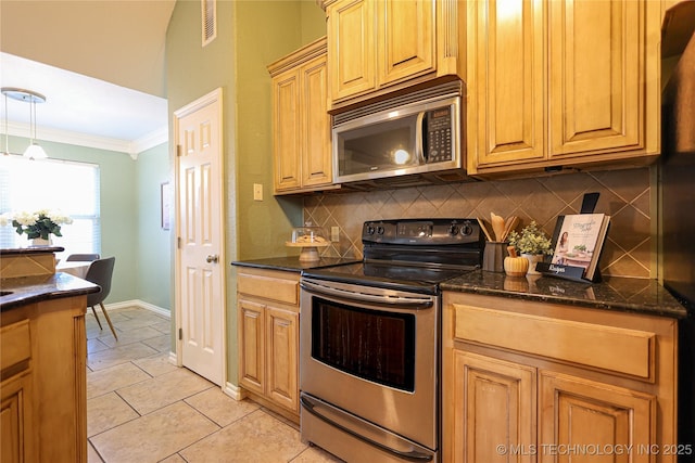 kitchen featuring stainless steel appliances, backsplash, pendant lighting, light tile patterned floors, and ornamental molding