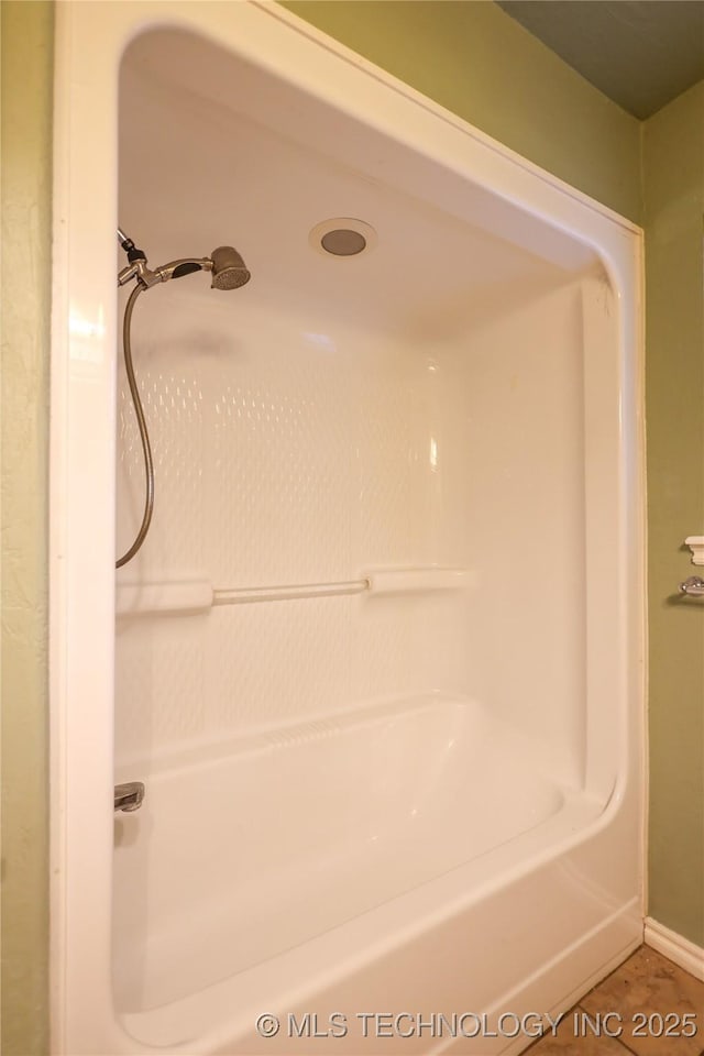 bathroom with tile patterned flooring