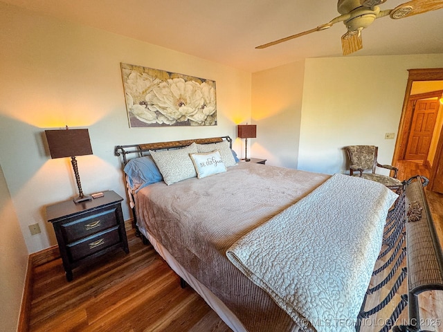 bedroom featuring dark wood-type flooring and ceiling fan