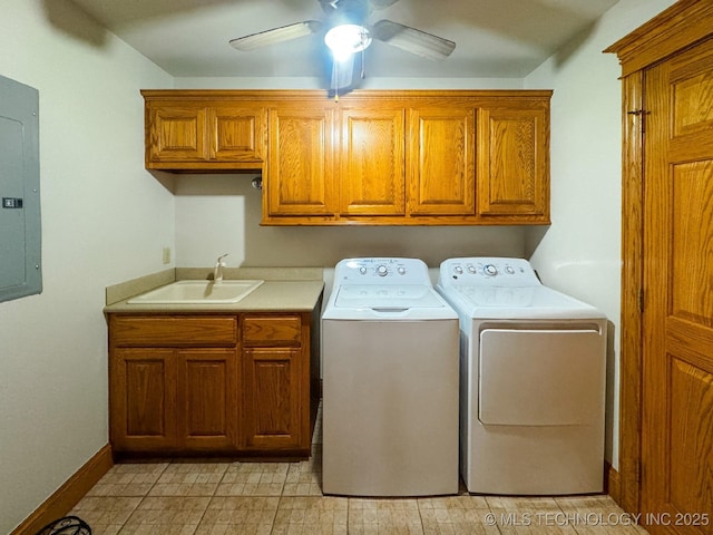 washroom with sink, cabinets, separate washer and dryer, electric panel, and ceiling fan