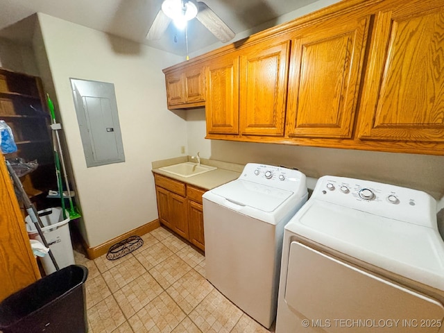 washroom featuring sink, cabinets, electric panel, ceiling fan, and washing machine and dryer