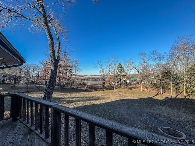 view of yard featuring a wooden deck