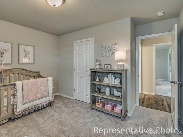 carpeted bedroom with a crib