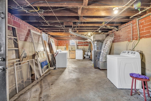 basement featuring washer and dryer