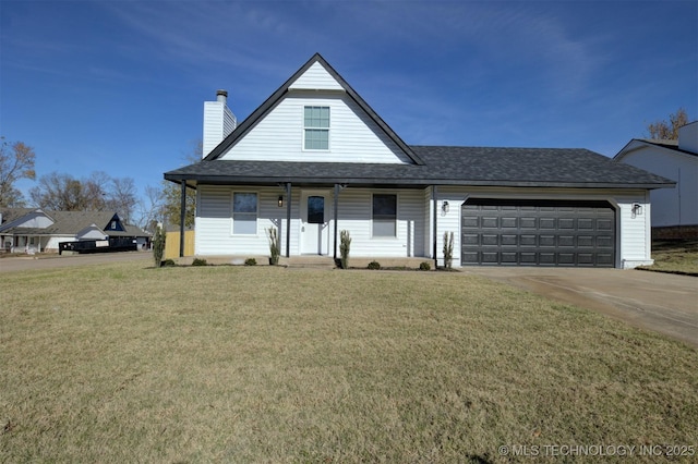 view of front of home featuring a garage and a front lawn