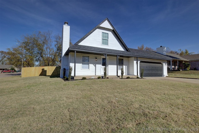 view of front of house with a front lawn and a garage