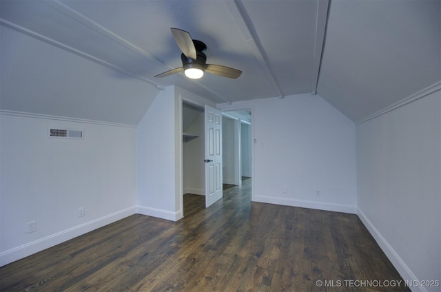 bonus room with ceiling fan, dark hardwood / wood-style floors, and vaulted ceiling