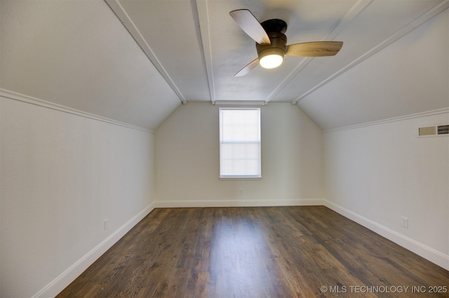 bonus room featuring ceiling fan, dark hardwood / wood-style flooring, and lofted ceiling