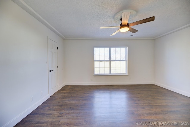 empty room with ceiling fan, dark hardwood / wood-style flooring, a textured ceiling, and ornamental molding