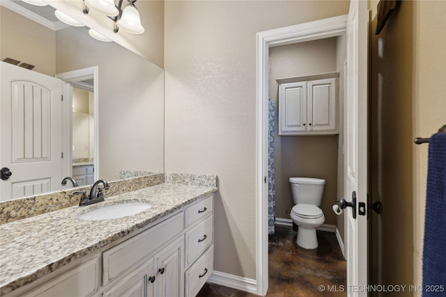 bathroom featuring vanity, concrete floors, and toilet