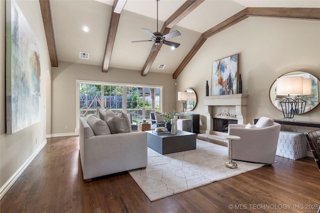 living room featuring vaulted ceiling with beams, ceiling fan, and dark hardwood / wood-style flooring